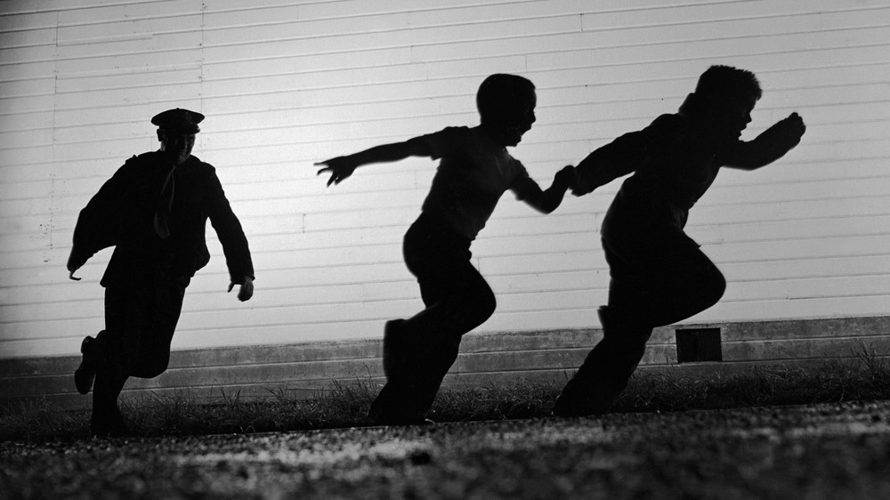 Children Run from Cop